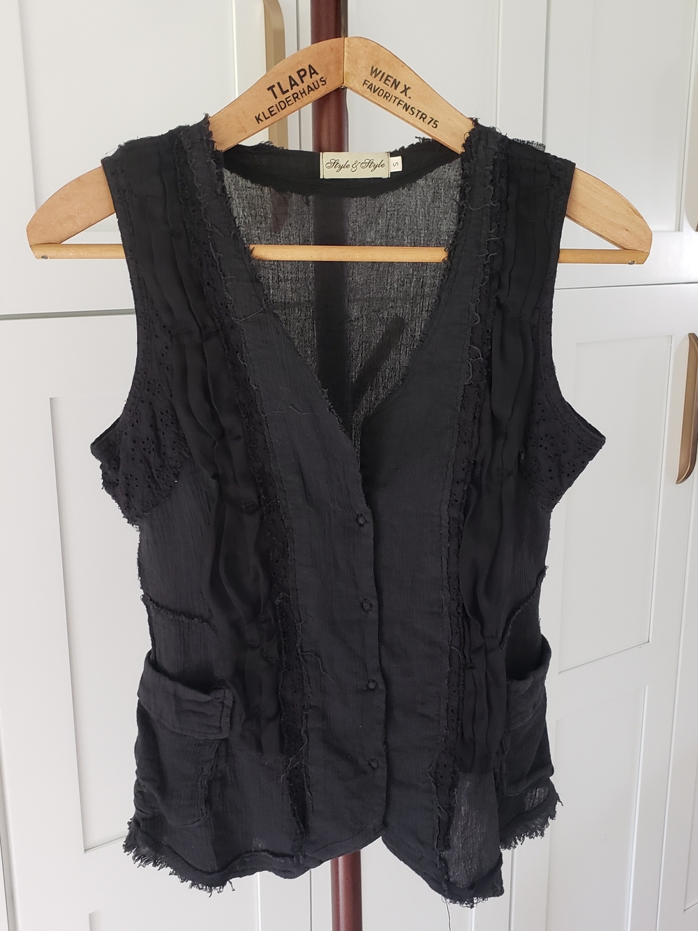 Black Sleeveless Button-Front Blouse